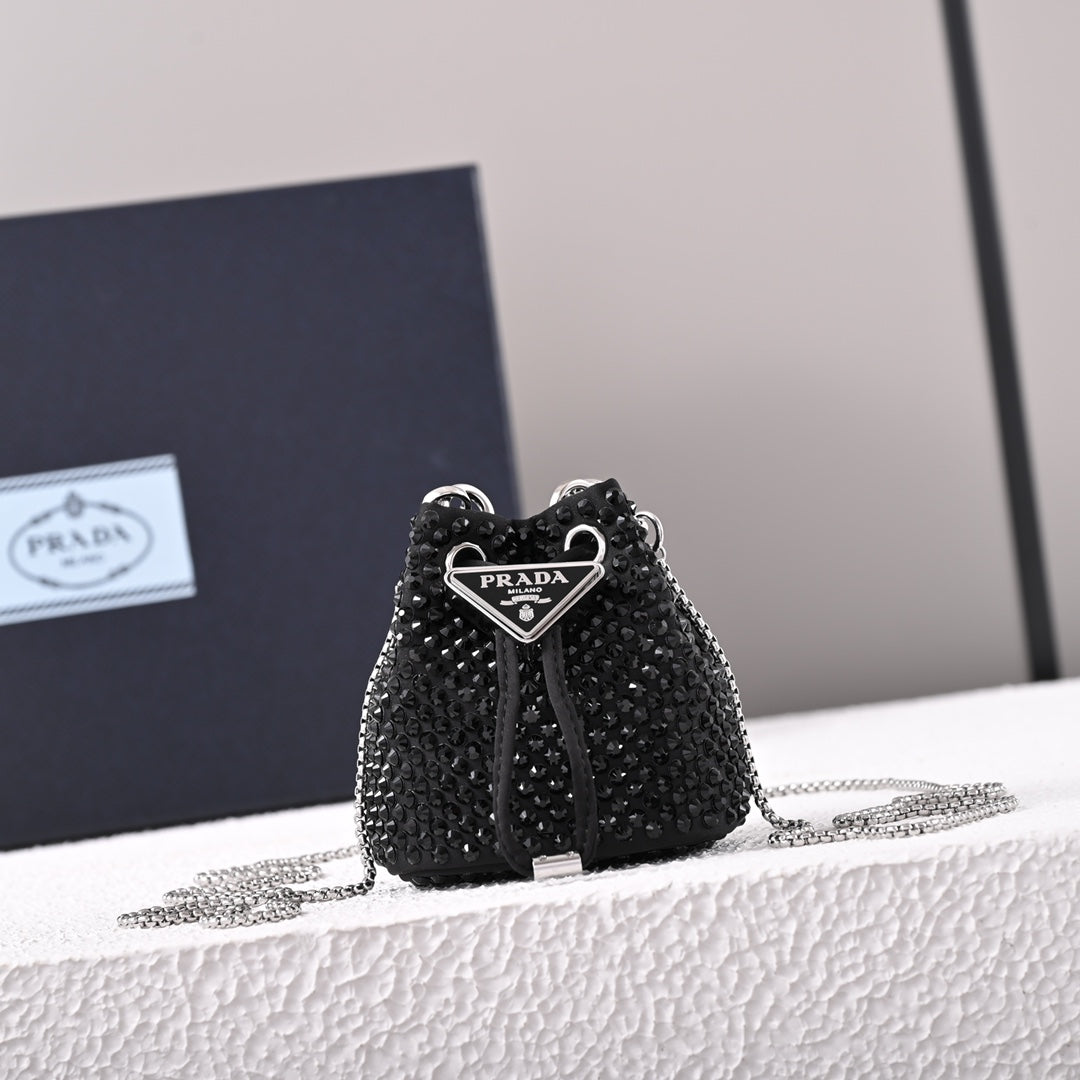 Mini-pochette en satin à ornements Pr@da