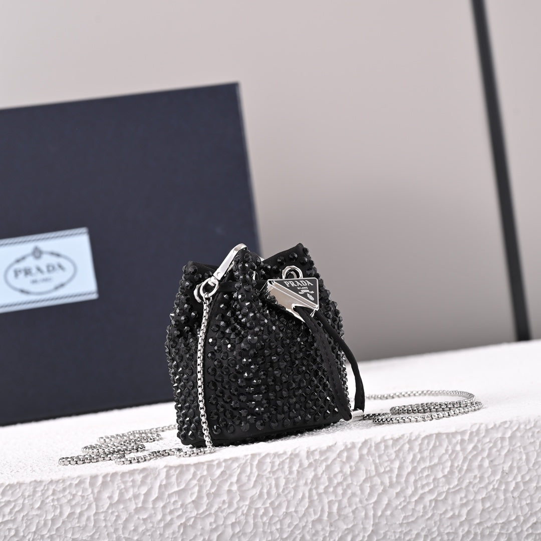 Mini-pochette en satin à ornements Pr@da