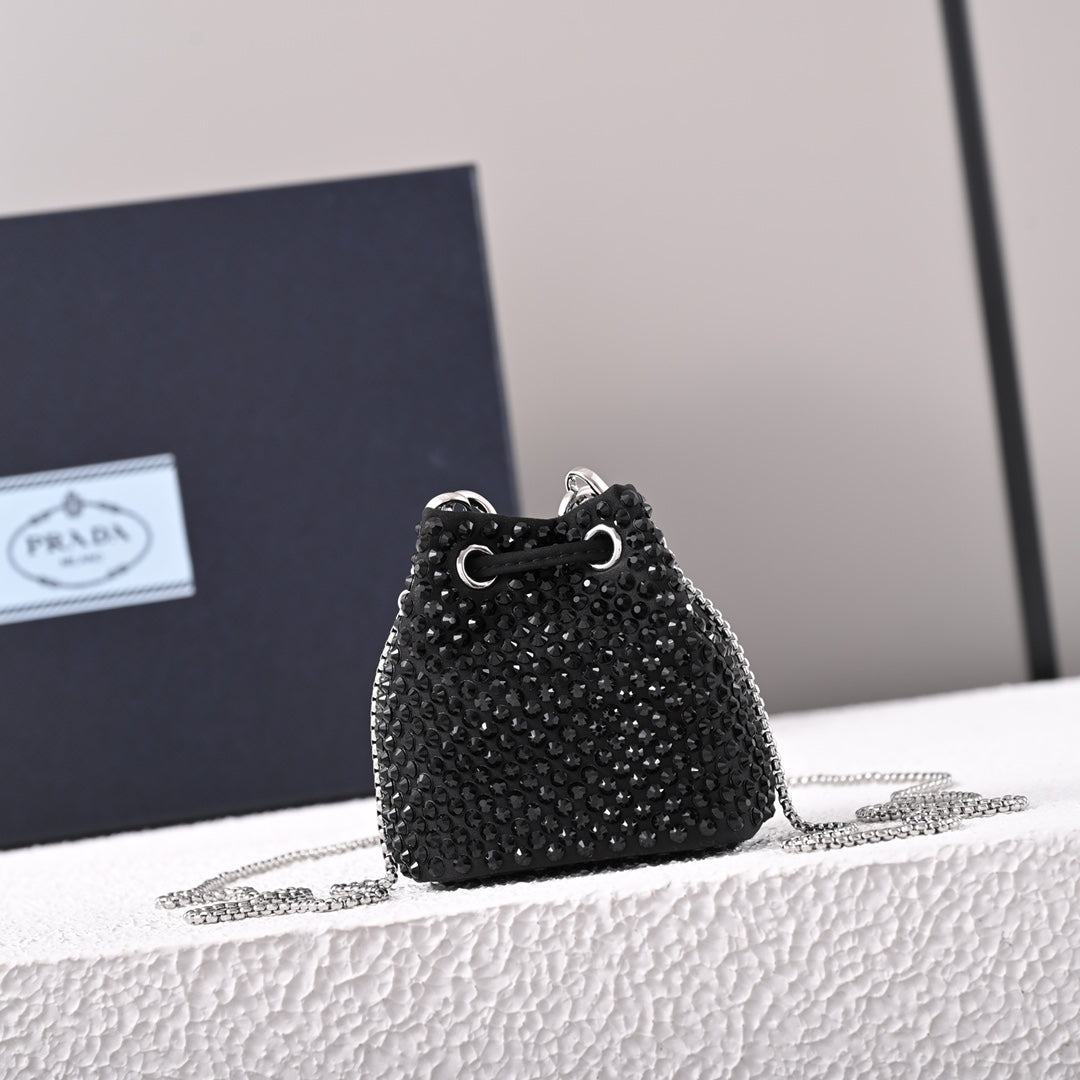 Mini-pochette en satin à ornements Pr@da