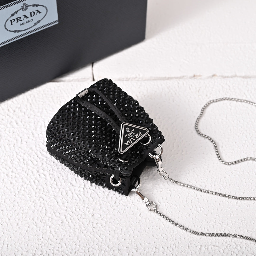 Mini-pochette en satin à ornements Pr@da