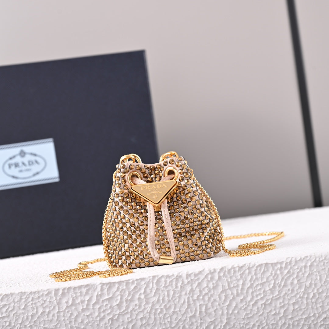 Mini-pochette en satin à ornements Pr@da
