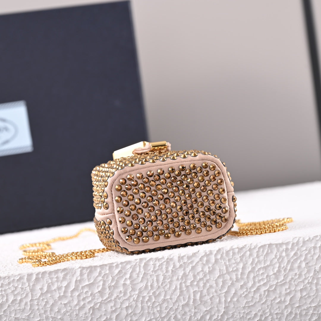 Mini-pochette en satin à ornements Pr@da