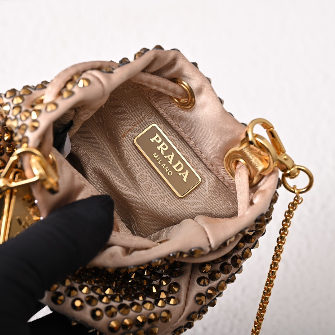 Mini-pochette en satin à ornements Pr@da
