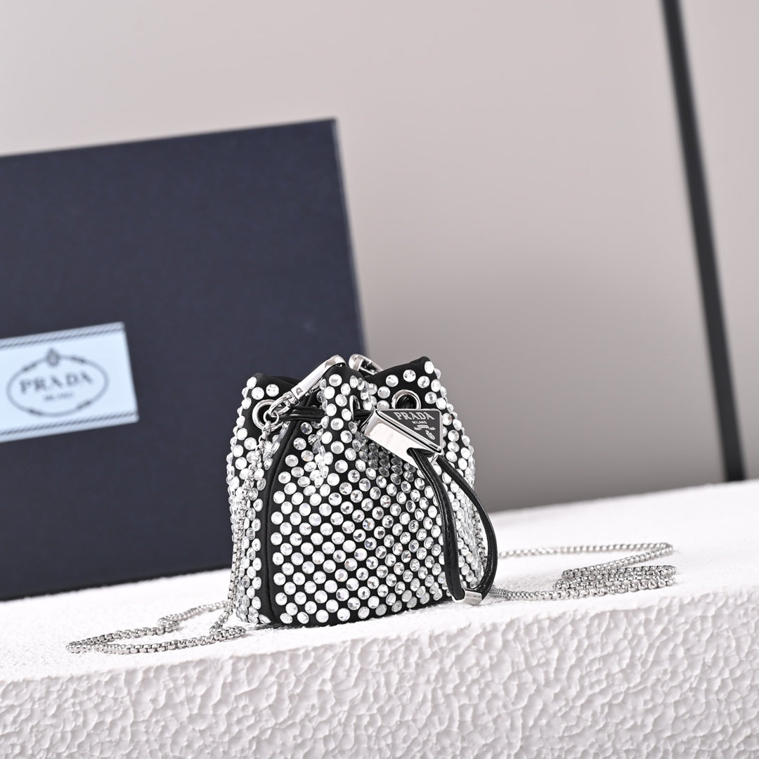 Mini-pochette en satin à ornements Pr@da