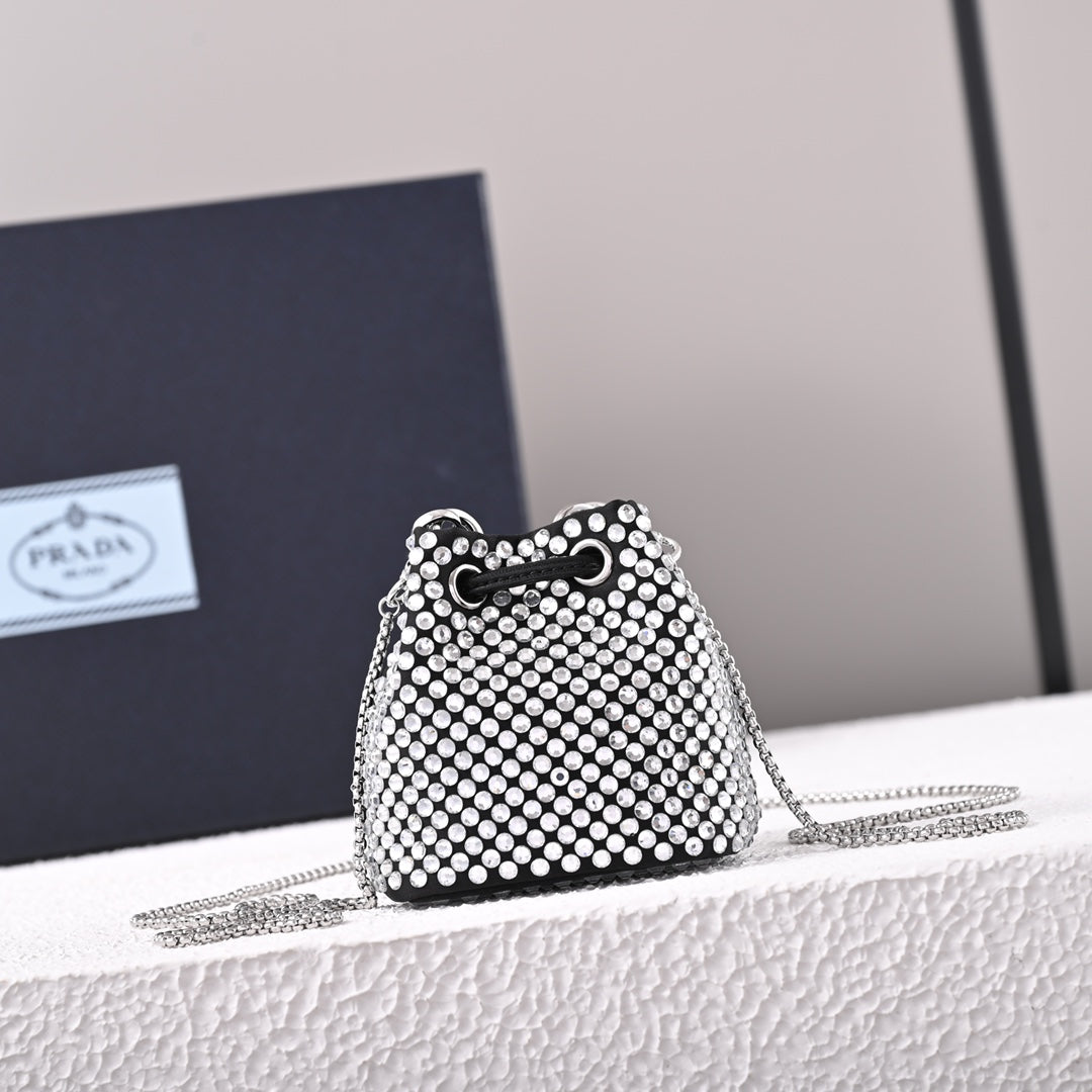 Mini-pochette en satin à ornements Pr@da